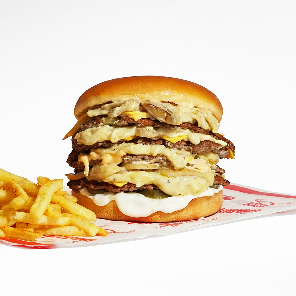 Burger mushroom cheese delight quadruple . Fries